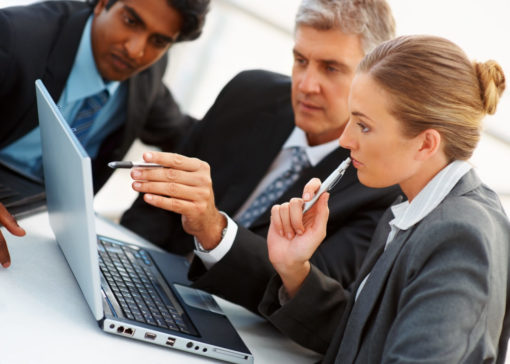 Business colleagues working on a laptop